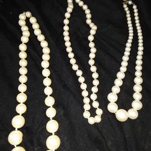 Faux pearl necklaces